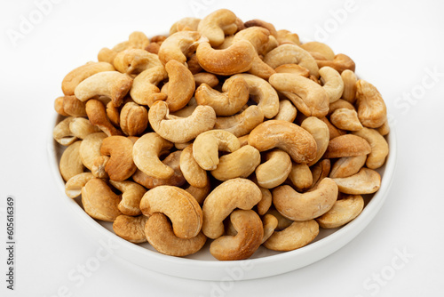 Dried cashew nuts. Macro shot. Raw snack. Pile cashew nuts without shell. Whole nut kernels