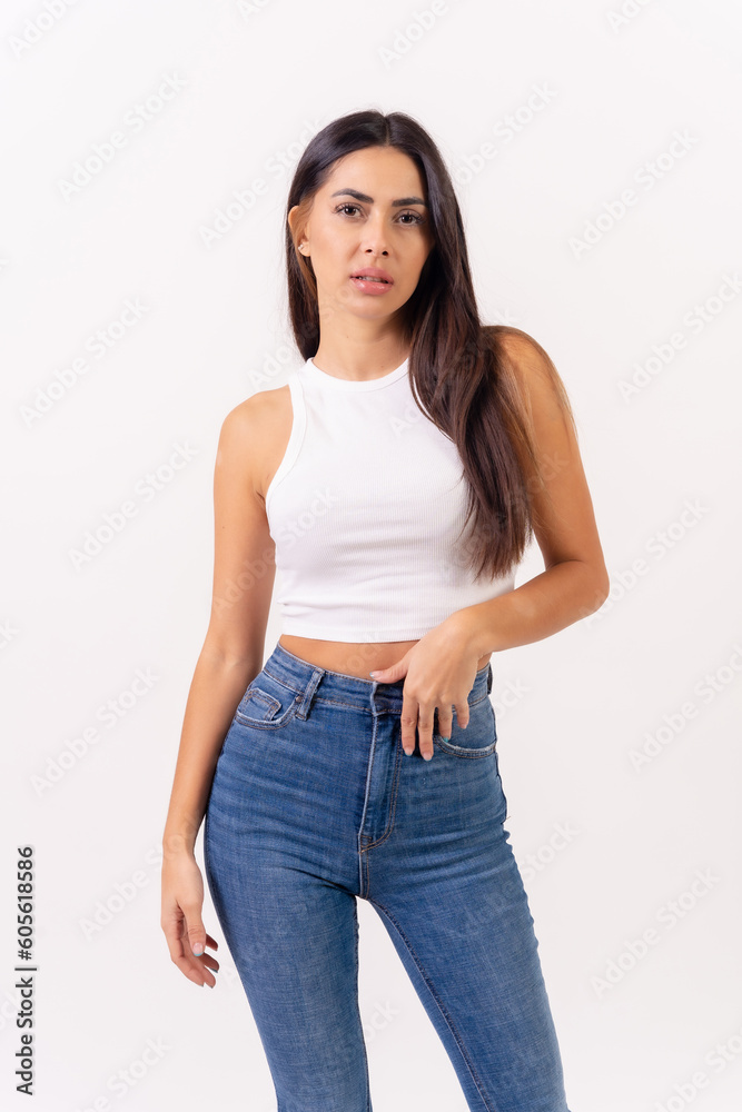 Brunette woman on a white background, casting studio shots, portrait in white t-shirt smiling Brunette woman on a white background, casting studio shots, portrait in white t-shirt smiling