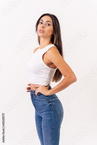 Brunette woman on a white background, casting studio shot, portrait of attractive young woman