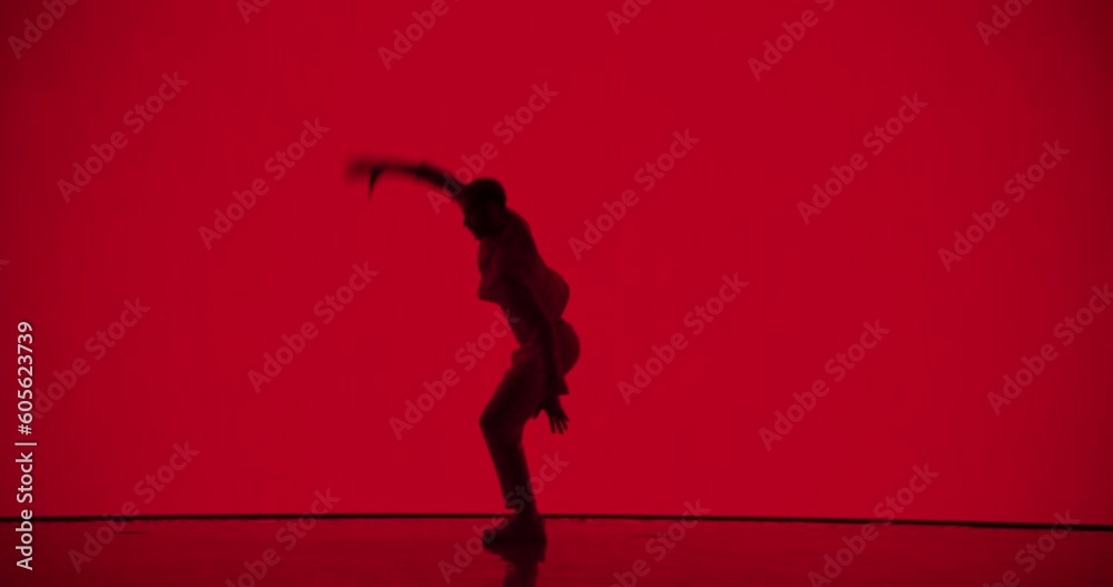 Male Dancer in White Clothes Unleashing an Energetic Fusion of Styles ...