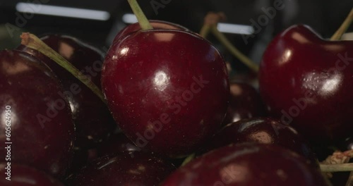 plums in wooden box and with laowa optics in moving close-up