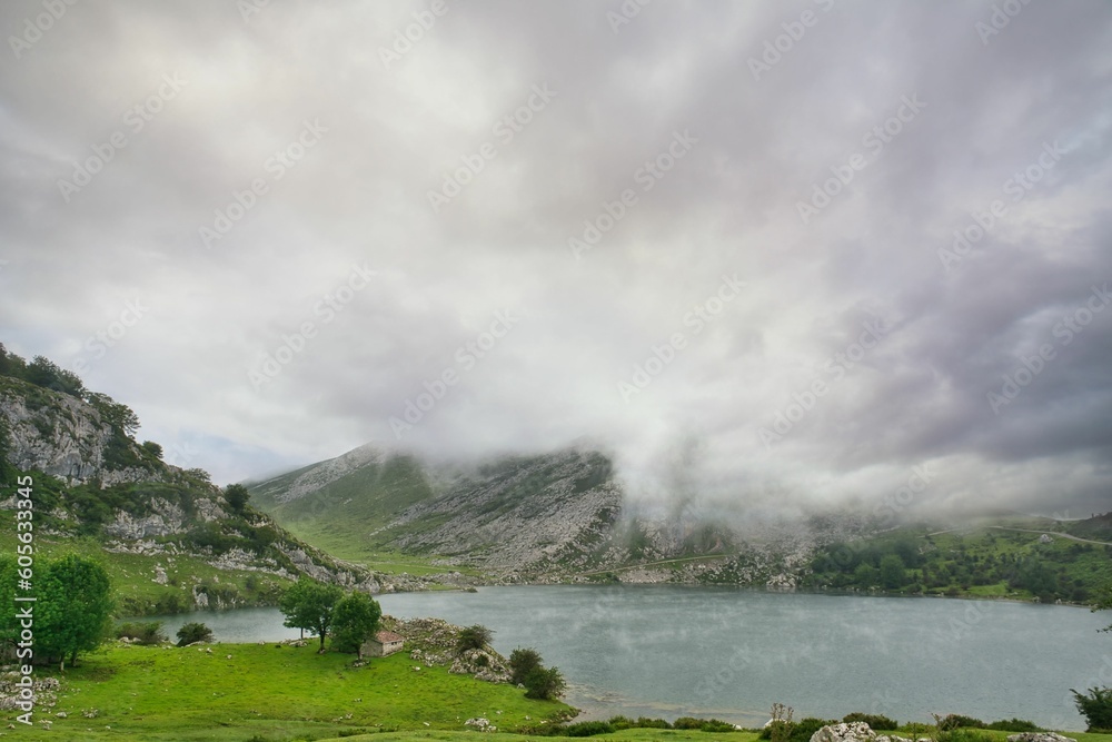 Beautiful landscape of a lake in rocky mountains on a cloudy day Beautiful landscape of a lake in rocky mountains on a cloudy day