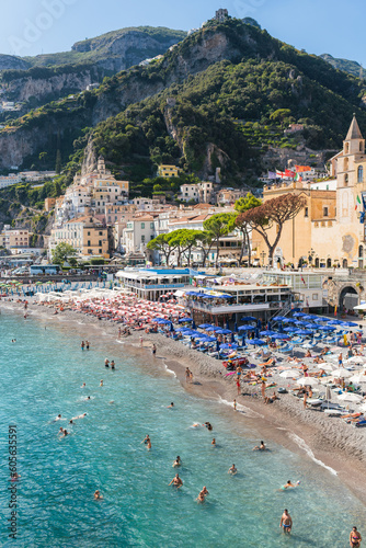 Fototapeta Naklejka Na Ścianę i Meble -  Tourists on the beach of the amalfi coast