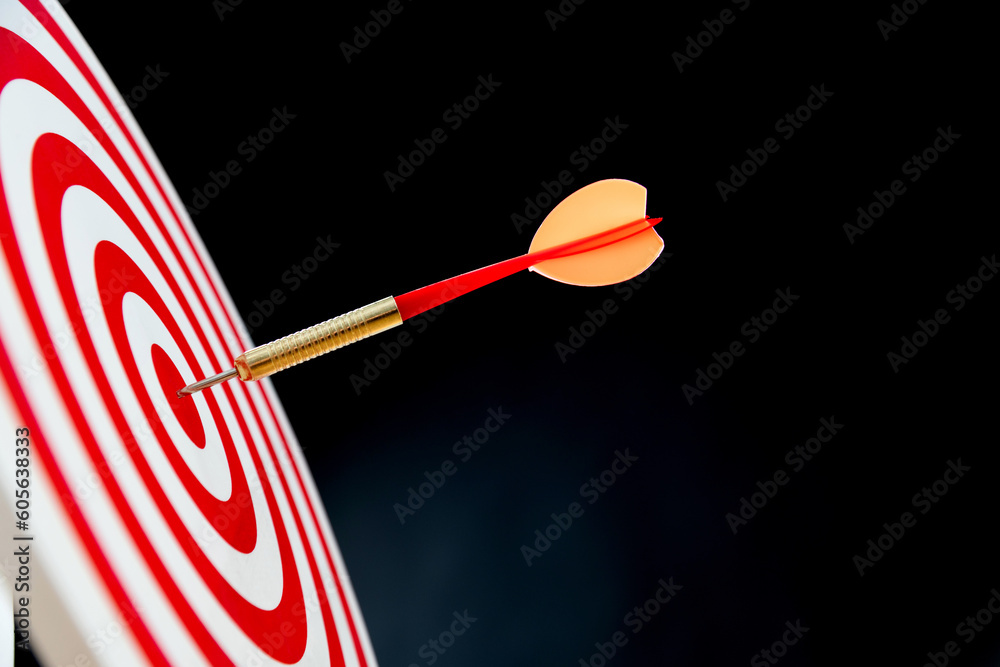 Dart hitting on center target Dart hitting on center target