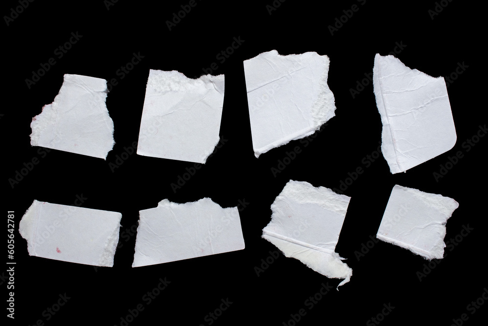 Ripped paper pieces isolated on a black background. Set of torn papers. Ripped paper pieces isolated on a black background. Set of torn papers.