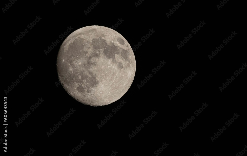 Super full moon isolated with dark background Super full moon isolated with dark background