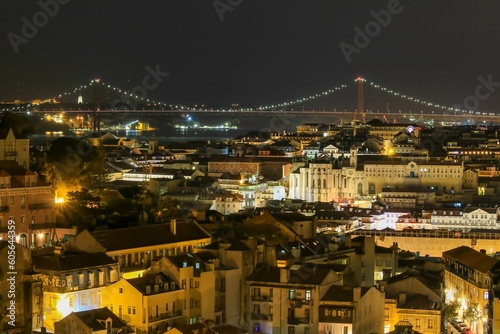 Aerial shot of the Miradouro da Graca viewpoint and the beauty of Lisbon at night, Portugal photo