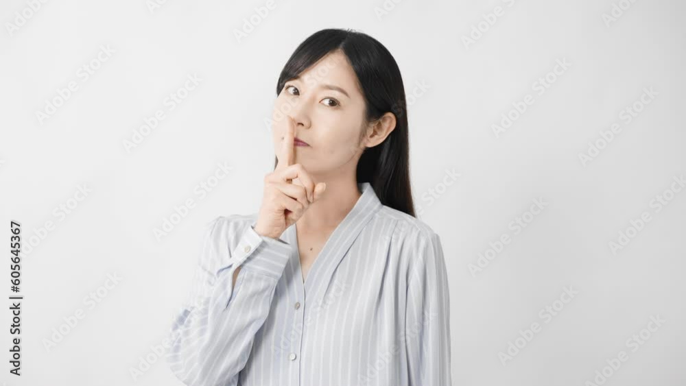 口に指を当てる若い女性 ビジネスイメージ
口に指を当てる若い女性 ビジネスイメージ