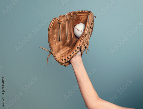 Canvas Print Hand in leather baseball glove caught a ball on dark gray background