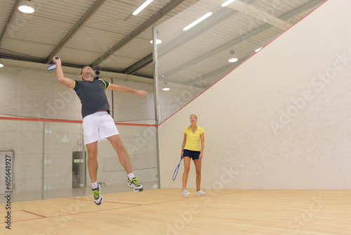 a friends doing squash sports