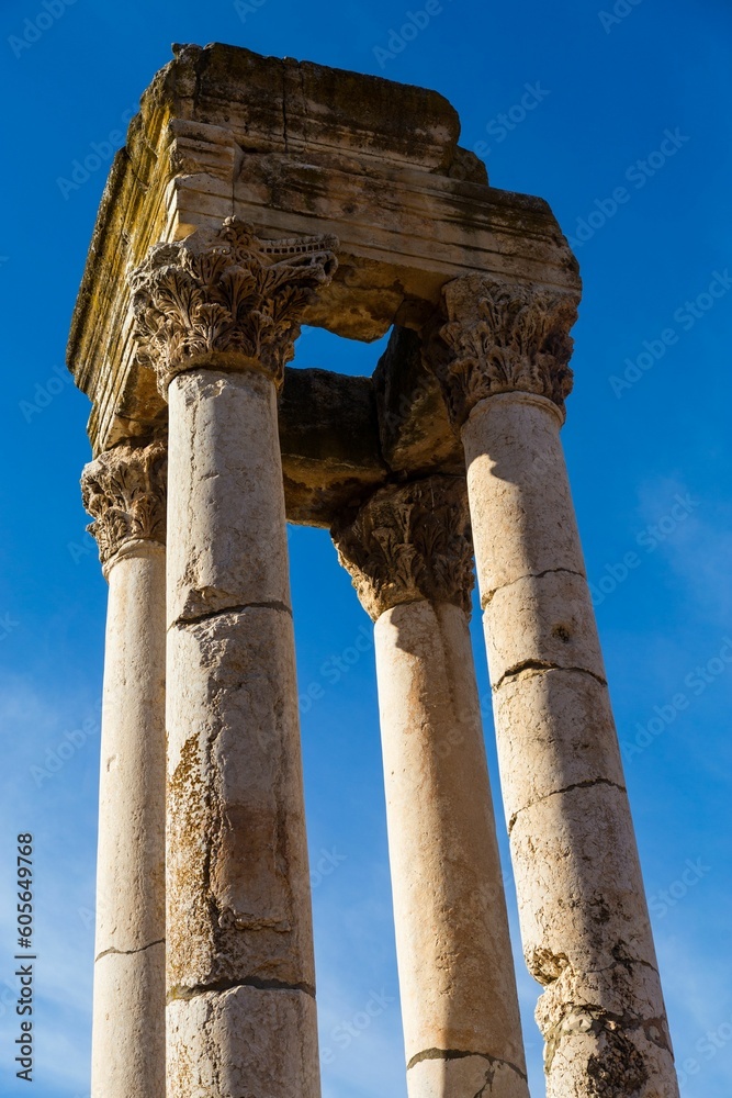 Corinthian columns in the ancient Umayyad city ruins, Anjar, Bekaa Valley, Lebanon. Vertical shot