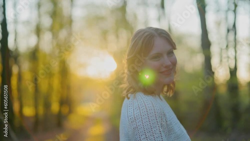 happy girl walking in a forest