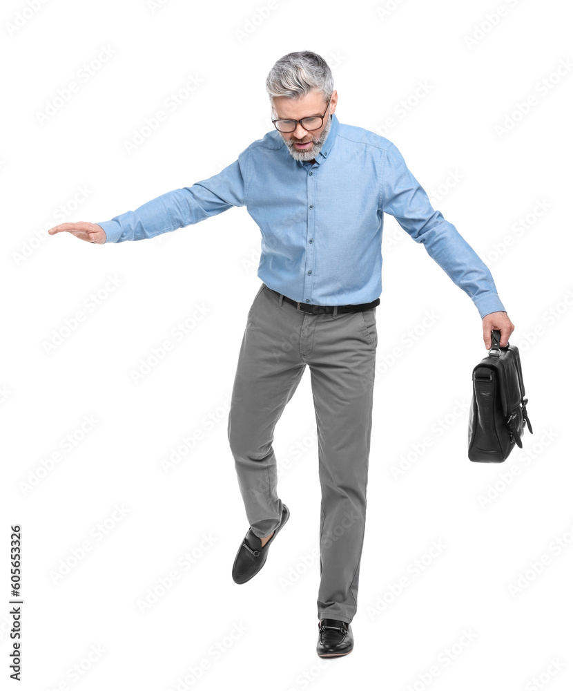 Mature businessman in stylish clothes with briefcase on white background Mature businessman in stylish clothes with briefcase on white background