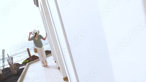 Wallpaper Mural Mediterranean luxury hotel elegant female arriving wearing sunhat  Torontodigital.ca