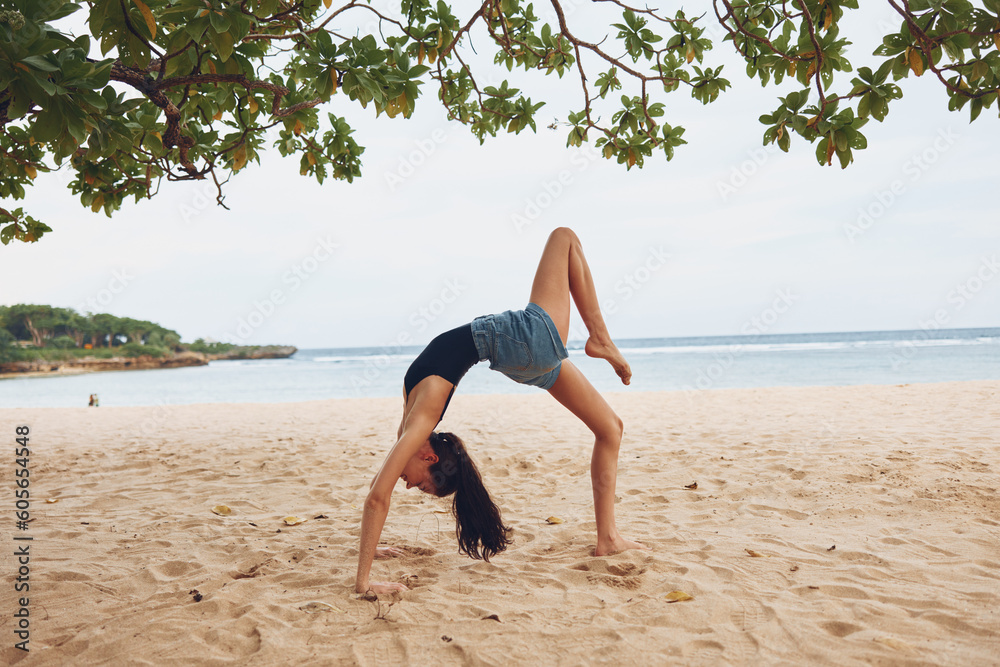 gymnastics woman yoga sport young bridge training exercise lifestyle bend beach gymnastics woman yoga sport young bridge training exercise lifestyle bend beach