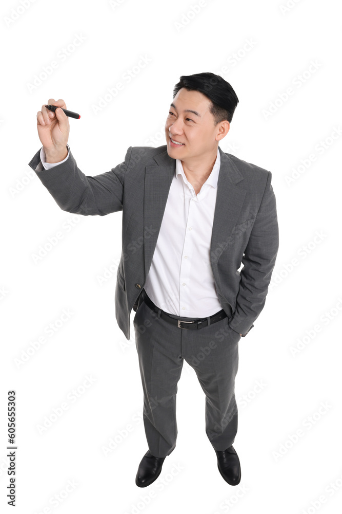 Businessman in suit with marker writing on white background, above view Businessman in suit with marker writing on white background, above view