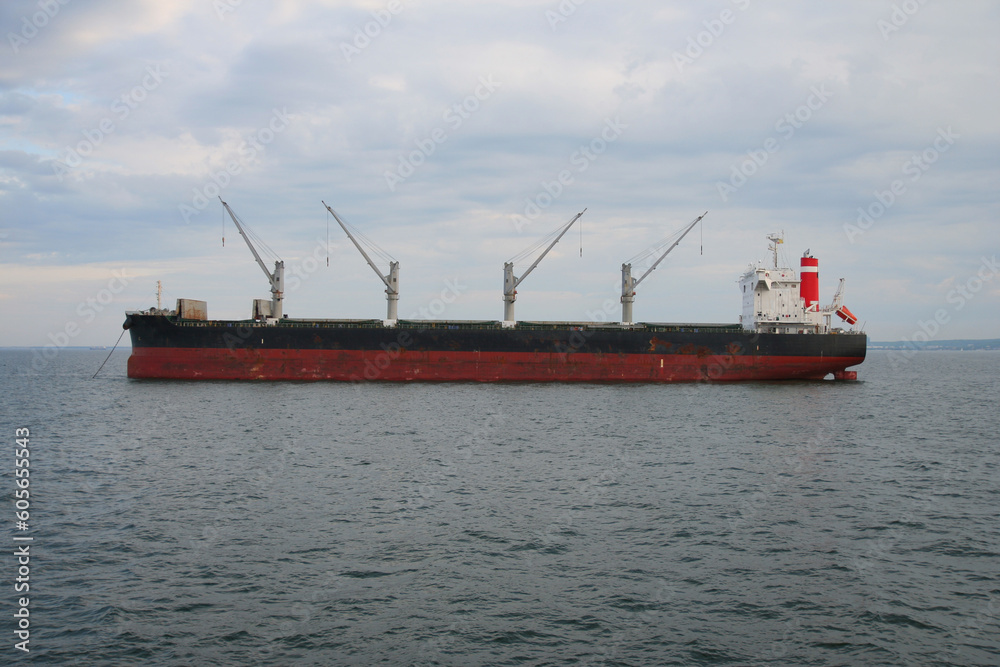 Large bulk carrier ship sailing in the Baltic sea. Freight transportation.