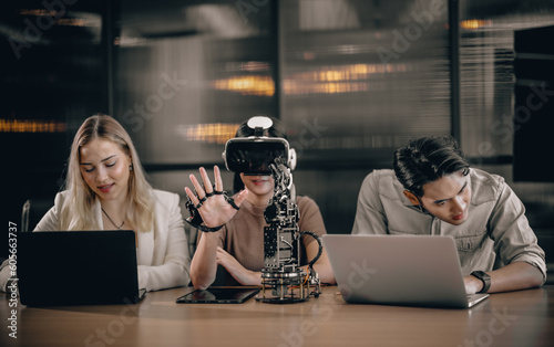 College students collaborate with research team to do experiment with educational robots. Wearing virtual reality goggle help learner to engage real, interacting situations with immersive experience.