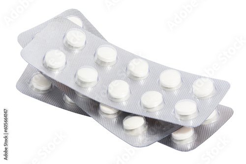 Fototapet Stack of blister packs with round pills on a white isolated background