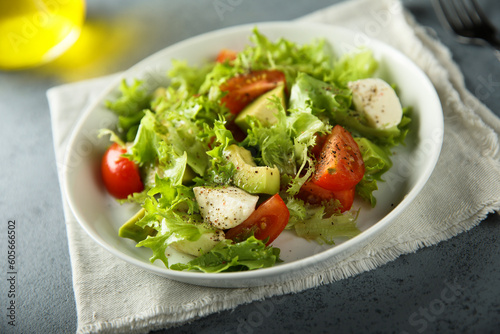 Healthy avocado salad with mozzarella cheese