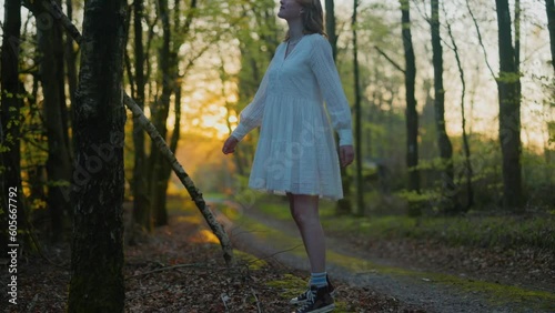 pretty girl walking in forest