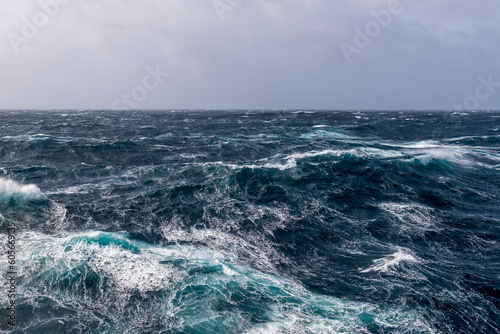 Beautiful seascape - waves and sky with clouds with beautiful lighting. Stormy sea, Bad weather. Gale. Rough sea. © Alexey Seafarer