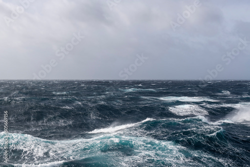 Beautiful seascape - waves and sky with clouds with beautiful lighting. Stormy sea, Bad weather. Gale. Rough sea. © Alexey Seafarer