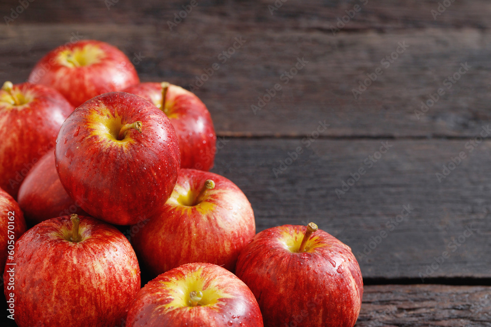 fresh red apples on the wooden floor fresh red apples on the wooden floor