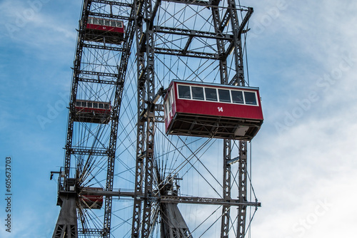 Close up of a ferris wheel in Prater, Vienna with blue sky in the background