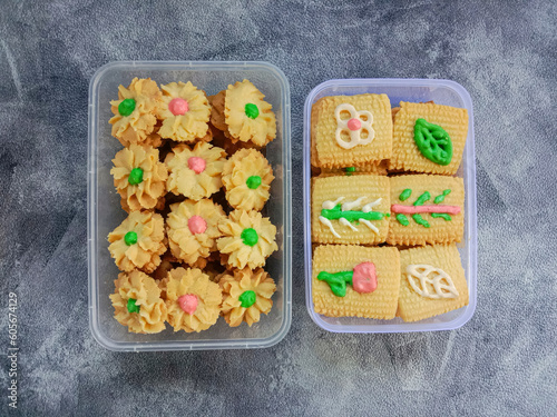 Kue Semprit or Semprit cookies, Indonesian cookies. Semprit cookies topped with colorful icing. photo