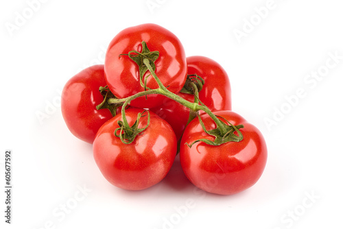 Tomato branch. Ripe fresh tomatoes, close-up, isolated on white background. © GSDesign