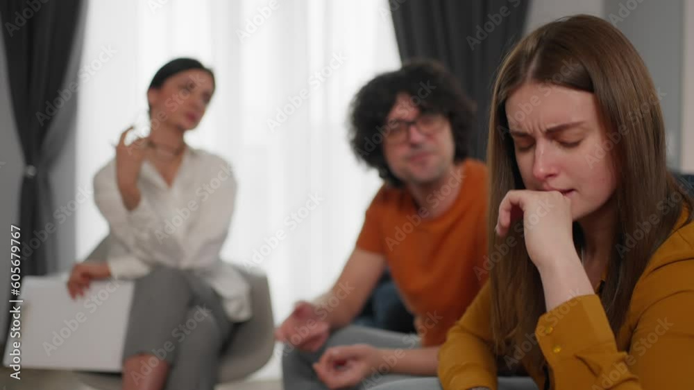 Angry and Aggressive Boyfriend loses Temper, emotionally Shouts at His Suffering Girlfriend. family Couple on a Counseling Session with Psychotherapist. Therapist Taking Notes. Angry and Aggressive Boyfriend loses Temper, emotionally Shouts at His Suffering Girlfriend. family Couple on a Counseling Session with Psychotherapist. Therapist Taking Notes.