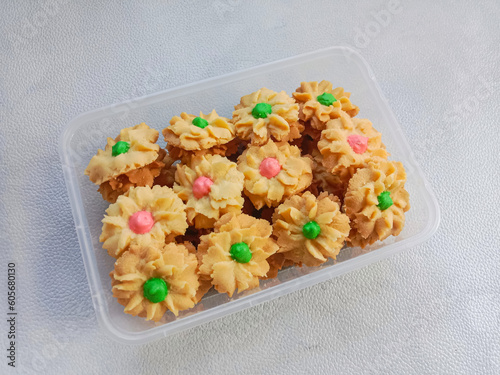 Kue Semprit or Semprit cookies, Indonesian cookies popular during eid mubarak. Semprit cookies topped with colorful icing. photo