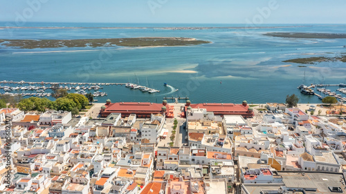 Aerial view of Portuguese fishing tourist town of Olhao with a view the Ria Formosa Marine Park. Sea port for yachts 