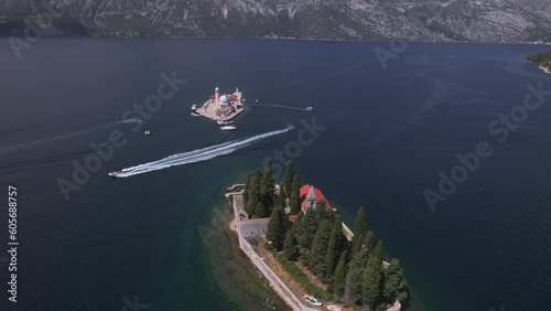Aerial panoramic drone view of Our Lady of the Rocks and St. George's Islands, near Perast, Bay of Kotor, UNESCO World Heritage Site, Montenegro photo