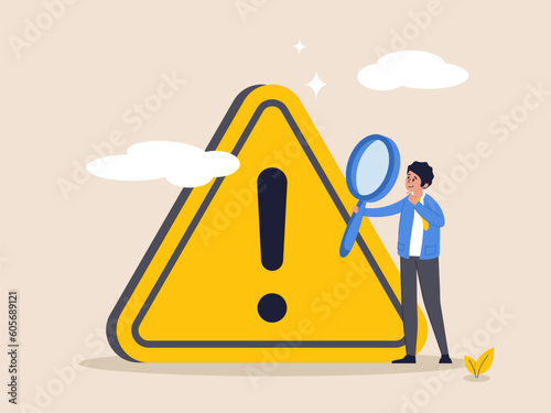 Critical failure concept. Incident management, root cause analysis or solving problem, identify risk, businessman with magnifier monitor and investigate incident with exclamation attention sign.