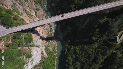 Aerial panoramic drone view of iconic Djurdjevica Tara concrete arch bridge over the river Tara, Montenegro  photo