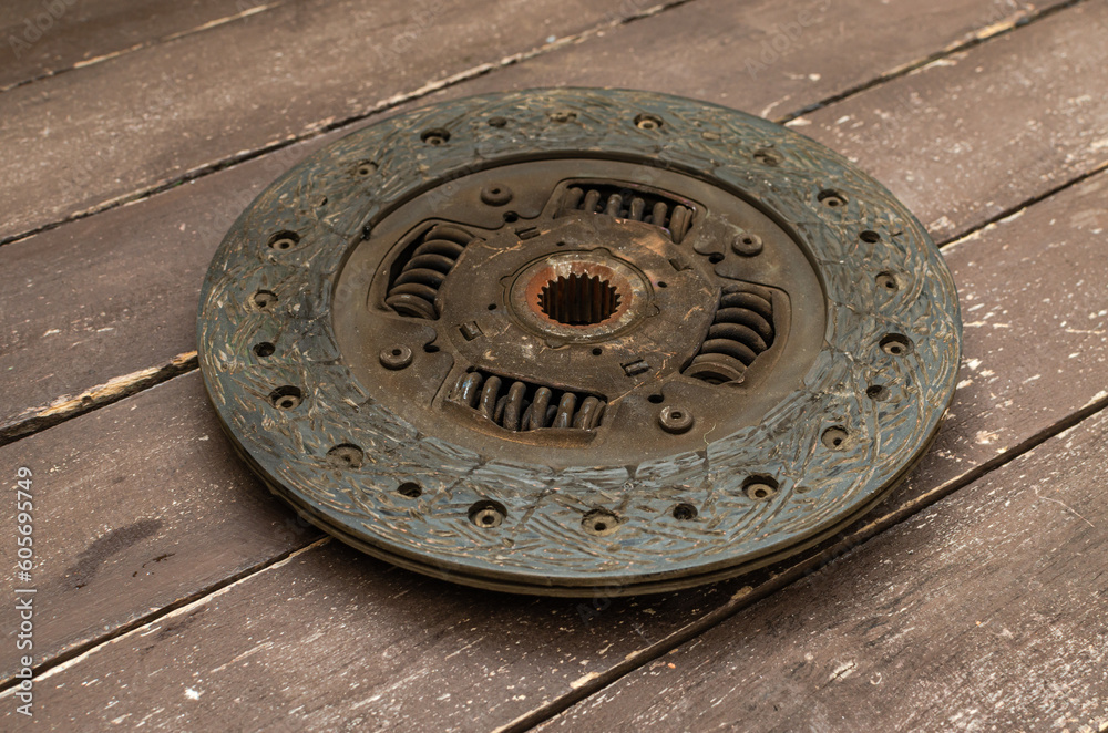 Disassembled clutch disc of a car in a car service repair shop Disassembled clutch disc of a car in a car service repair shop