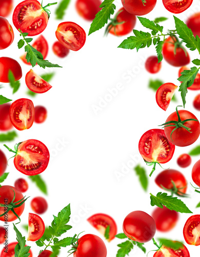 Flying cut out red ripe juicy tomatoes and green leaves isolated on white background. With clipping path. Healthy vegan organic food, vegetable, cherry tomatoes. Creative food concept. Tomatoes patter