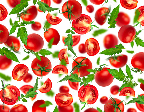 Tomatoes pattern. Creative food concept. Red ripe juicy cut out tomatoes with green tail isolated on white background. With clipping path. Healthy vegan organic food, vegetable, cherry tomatoes, summe