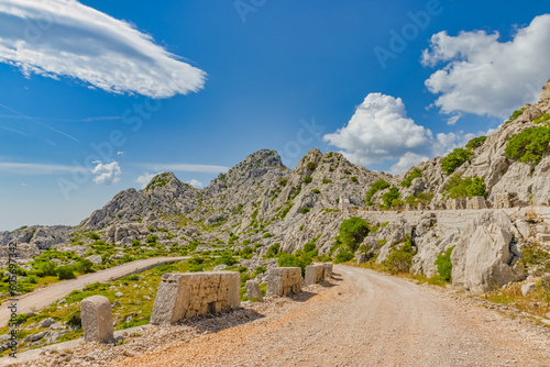 Velebit mountain wild road scene in summer time