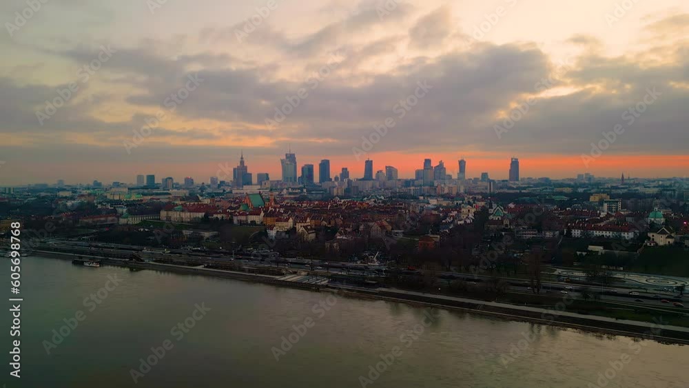 Night Warsaw's Old Town viewed from the royal castle at a height. Beautiful architecture and city lights in Poland. Modern downtown financial center view after sunset, dusk cityscape, skyline. Aerial Night Warsaw's Old Town viewed from the royal castle at a height. Beautiful architecture and city lights in Poland. Modern downtown financial center view after sunset, dusk cityscape, skyline. Aerial