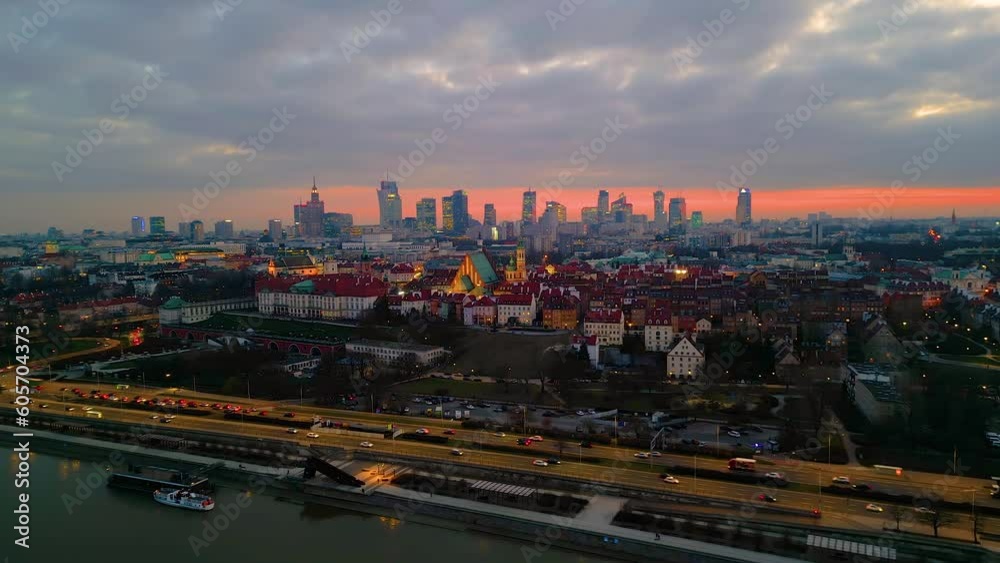 Night Warsaw's Old Town viewed from the royal castle at a height. Beautiful architecture and city lights in Poland. Modern downtown financial center view after sunset, dusk cityscape, skyline. Aerial Night Warsaw's Old Town viewed from the royal castle at a height. Beautiful architecture and city lights in Poland. Modern downtown financial center view after sunset, dusk cityscape, skyline. Aerial