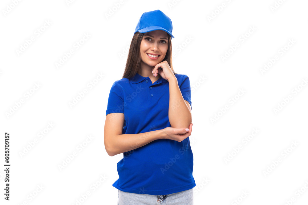 young caucasian brunette woman in blank blue t-shirt and cap young caucasian brunette woman in blank blue t-shirt and cap