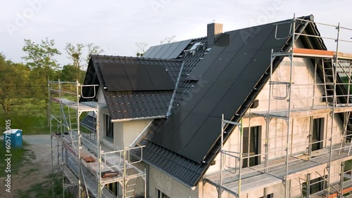 Construction site of a sustainable single family house with solar panels