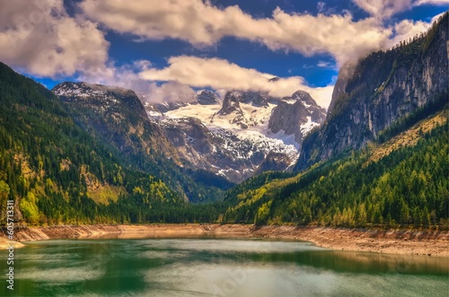 Mountain lake in Austrian Alps. View of Hoher Dachstein and Mitterspitz from the lake Vorderer Gosausee in Austria. photo