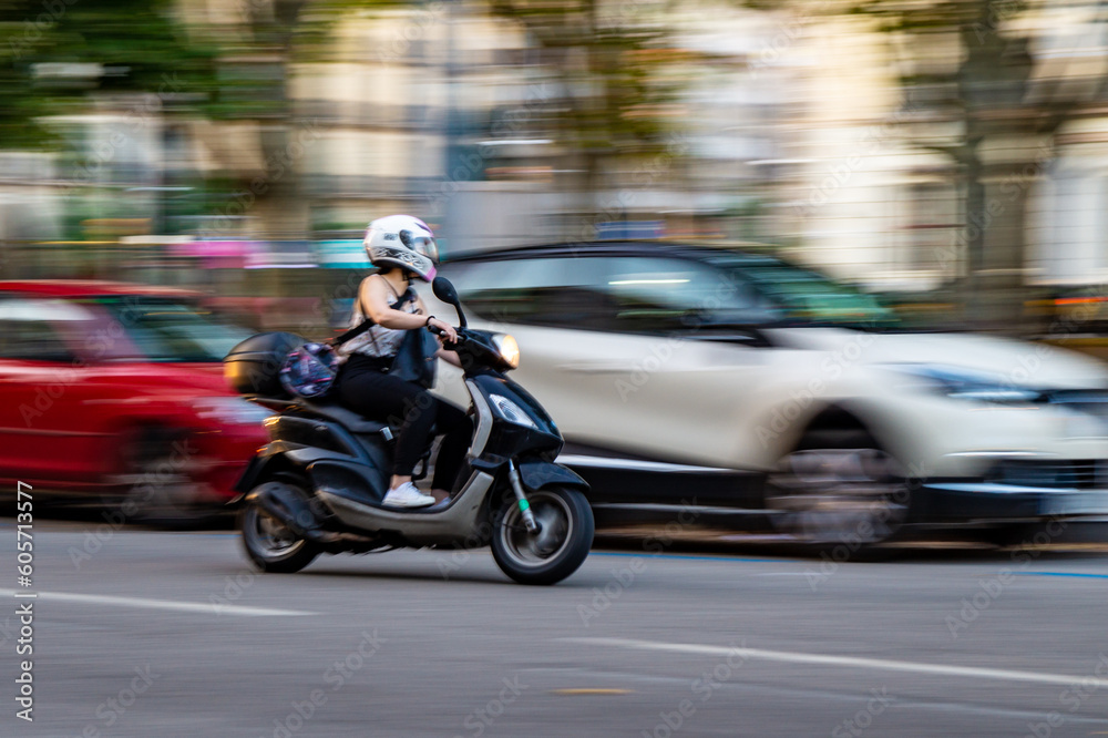 Fast riding scooter with motion blur. Fast riding scooter with motion blur.