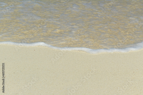 wave and white sand