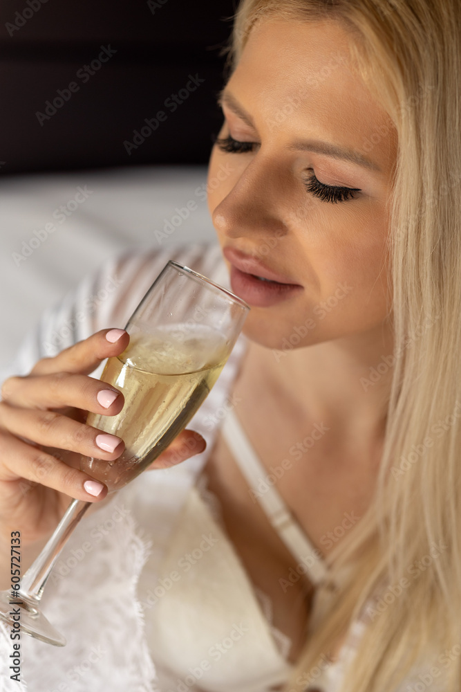 a pretty woman is drinking a glass of champagne, concept of party celebrations, birthdays, weddings, new year, concept of alcohol dependence, alcoholic women a pretty woman is drinking a glass of champagne, concept of party celebrations, birthdays, weddings, new year, concept of alcohol dependence, alcoholic women