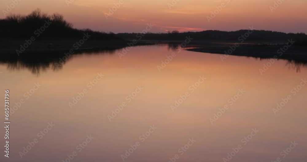 Evening calm lake under a cloudy sky Evening calm lake under a cloudy sky